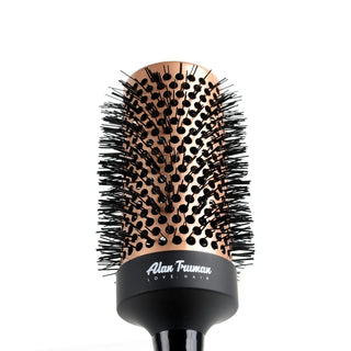 Nylon bristles of the Gold Ceramic Blow Drying Brush for fabulous shine and volume.